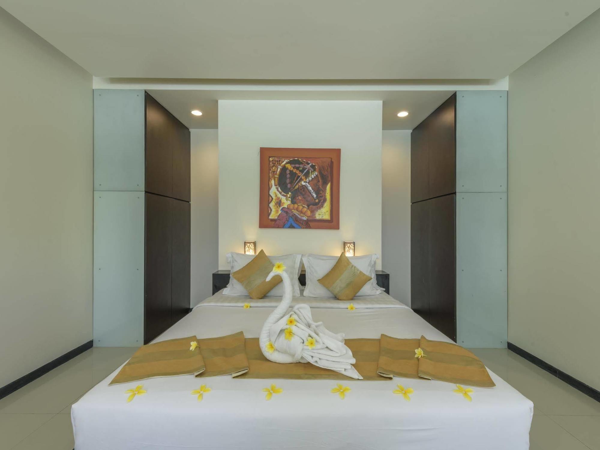 Aparthotel Swiss-Belcourt Sunset Seminyak Exterior foto